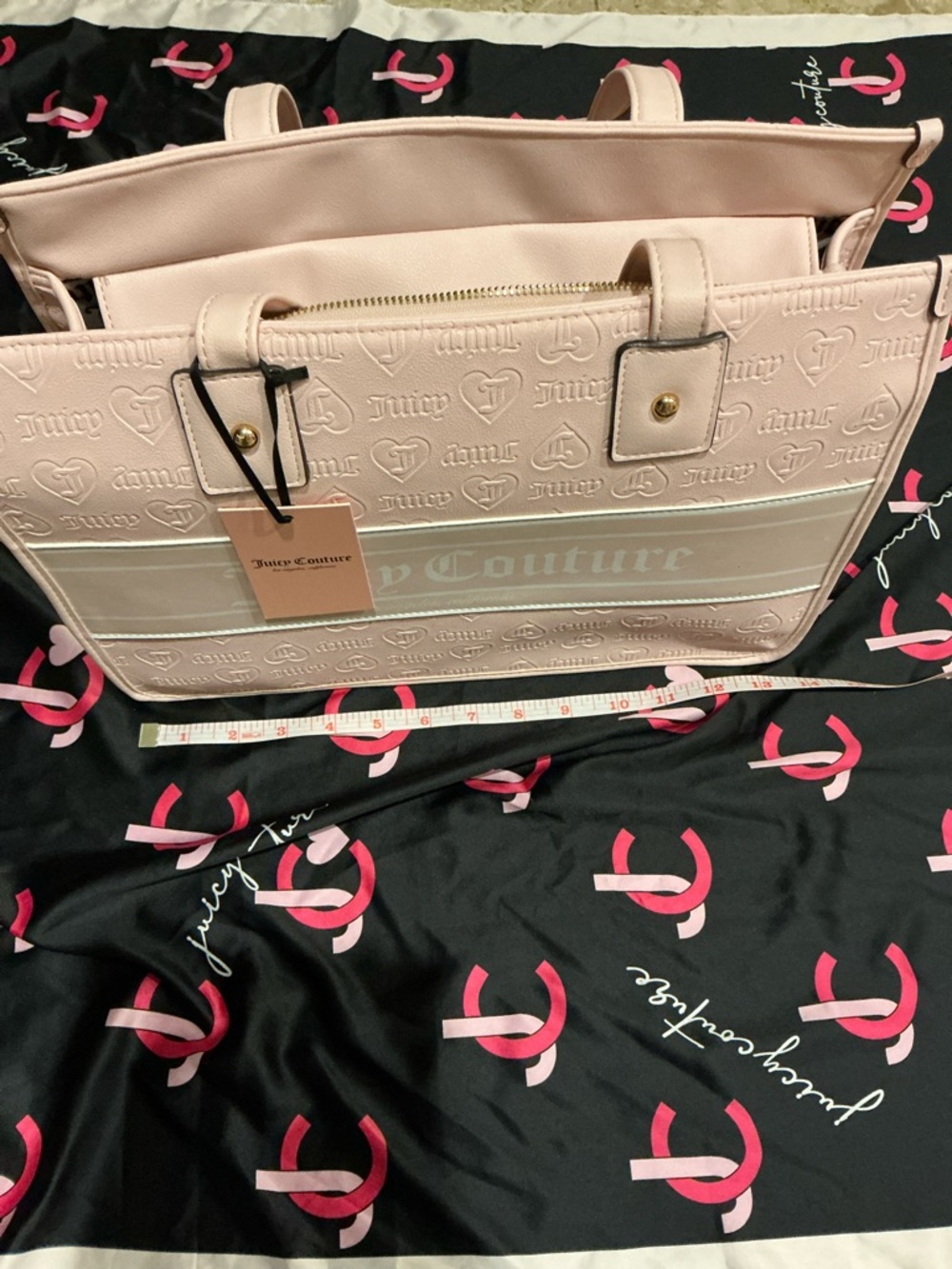 Juicy Couture tote bag with zip top. Light pink Juicy debossed logo NEW